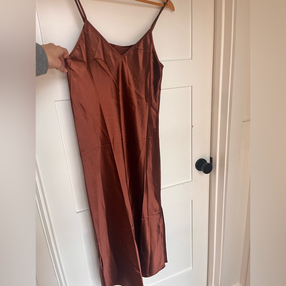 Classic satin slip dress in copper. Midi length.